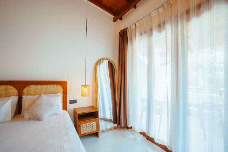 Room with mirror and curtains for the night